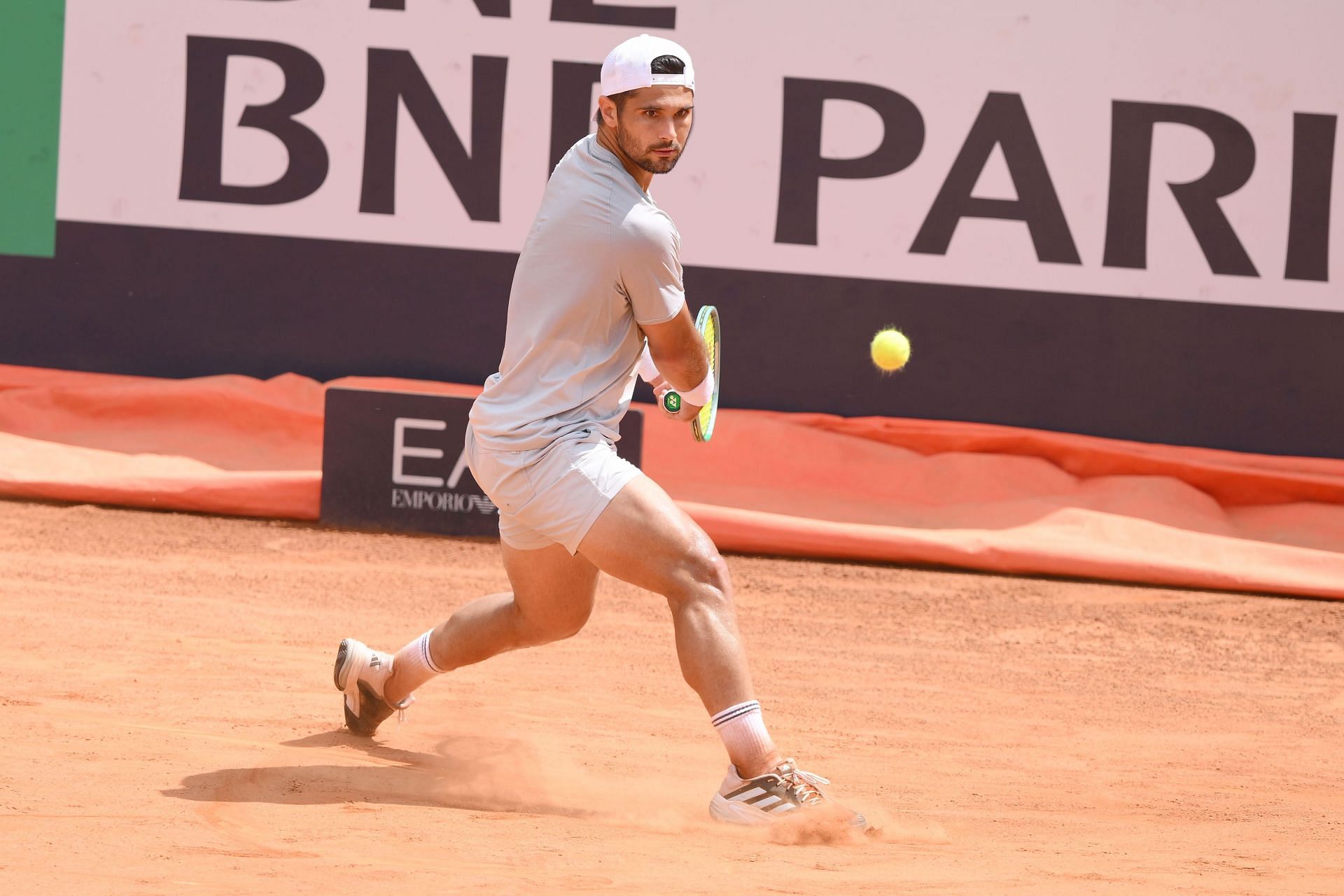 Marcos Giron hits a backhand | Image Source: Getty